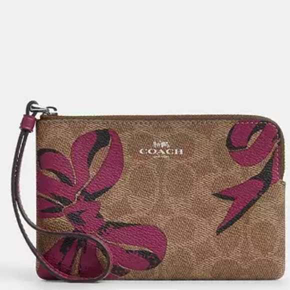 Coach Corner Zip Wristlet in Signature Canvas with Bow Print - Picture 1 of 4